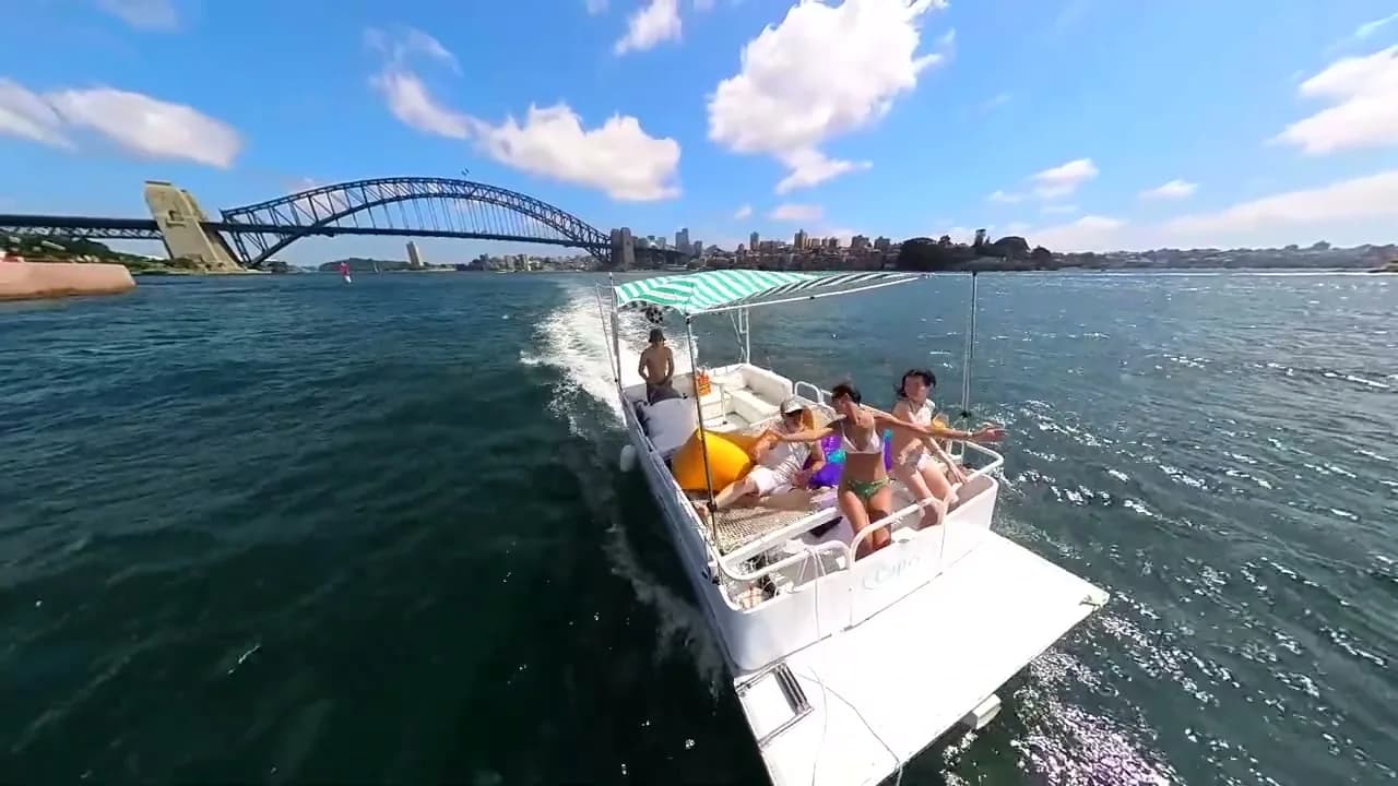 Capri underway with the Harbour Bridge behind