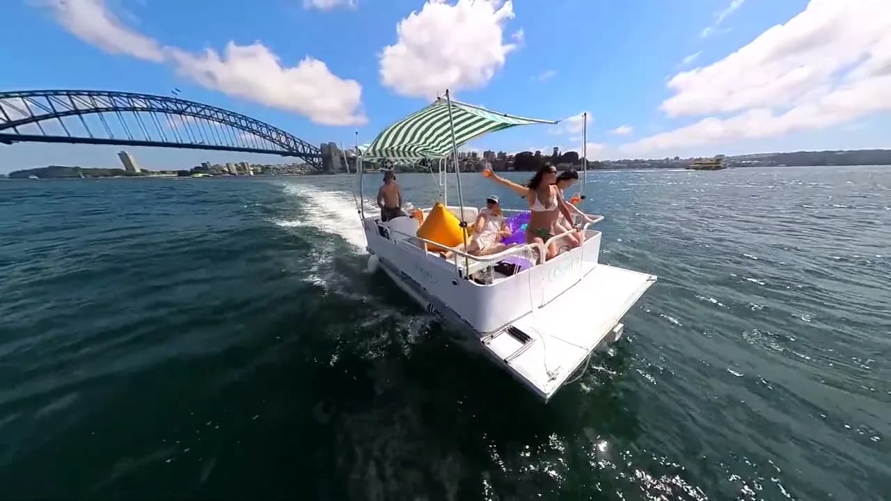 Capri underway with the Harbour Bridge behind
